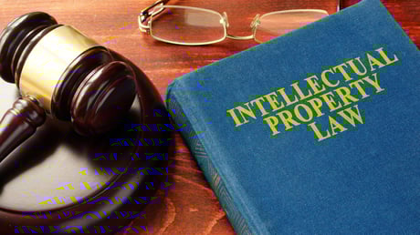 Intellectual Property Law book with a gavel