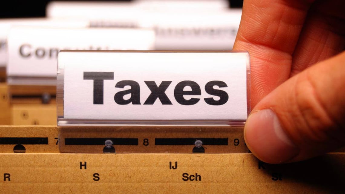 file folder with Taxes on the label